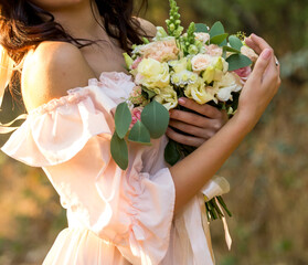 beautiful stubborn girl in a pink dress.