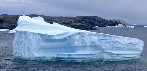 Iceberg in antarctic ocean, with interesting structure closeup, Antarctica