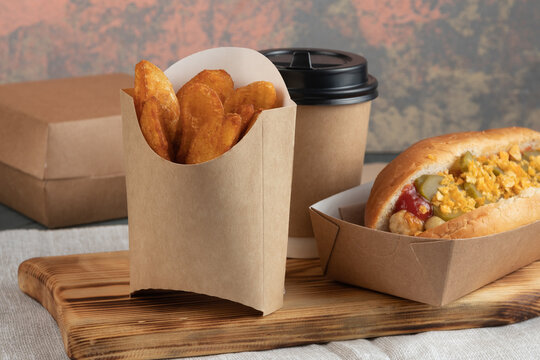 Eco packaging - Hot dog in craft packaging for delivery service. Fast food.