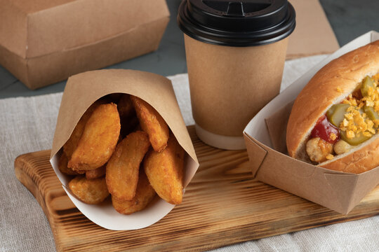Eco packaging - Hot dog in craft packaging for delivery service. Fast food.