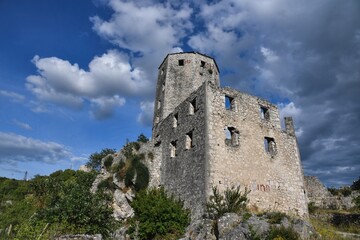 Fototapeta na wymiar Pocitelj / Bosnia and Herzegovina - 06 June 2020: Old fortress in city Pocitelj. 