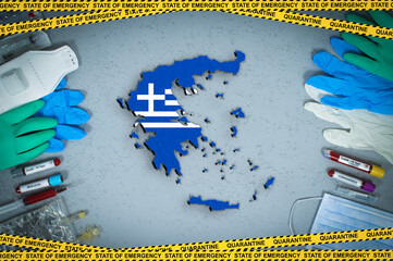 Extraordinary measures under Greece quarantine and coronavirus. Greece flag and map on vacutainer...