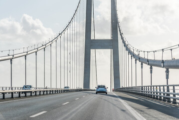 Cars on the suspension bridge over the great belt in Denmark, May 23 2020
