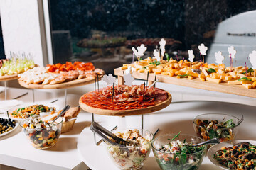 festive buffet slicing cheese sausage snack bread