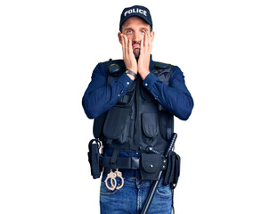 Young handsome man wearing police uniform tired hands covering face, depression and sadness, upset...