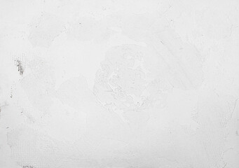 Textured paint floor with transitions of white tones. Blended background of white colors with an abstract wavy brush.