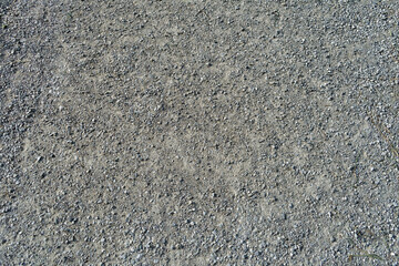 Gravel road surface texture with small pebbles
