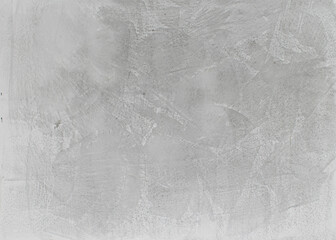 Obraz na płótnie Canvas Gray background or texture. Texture of white gray wall. Abstract brush and gray textured wall plaster with a blow texture. Decorative textured paint.
