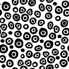 Abstract seamless pattern with black spots and circles