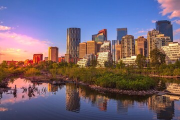 Downtown Calgary Skyline Reflecting In Water