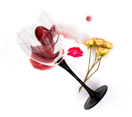 Dry sweet white wine in a broken glass, rose flower and a lipstick kiss isolated on white background. For winery, bar or restaurant tasting event or party ads, cards or posters