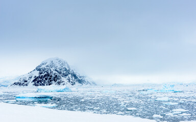 Pieces of ice on the surface of the ocean in Antarctica