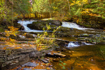 Naklejka na ściany i meble Double Waterfall with fall foliage on the Falls River in the small town of L'Anse in the Upper Peninsula of Michigan.