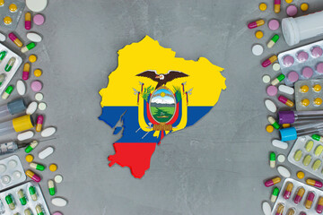 The Ecuador State began research for treatment and medicine to combat the pandemic outbreak disease coronavirus. Medicine, pills, needles, syringes and Ecuador map and flag on gray background.