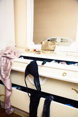 fashion style clothers disorganazed, mess in wardrobe concept