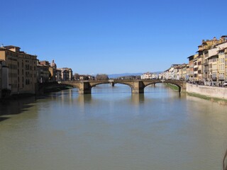 Fototapeta premium View of the Ponte Santa Trìnita, or the St. Trinity Bridge, as seen from the Ponte Vecchio in Florence, Italy 