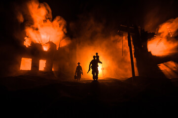 Two homeless little girl walking in destroyed city, soldiers and helicopters and tanks are still...