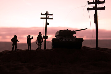 War Concept. Military silhouettes fighting scene on war fog sky background, World War Soldiers Silhouette Below Cloudy Skyline At sunset.