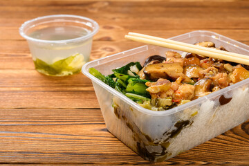 side view fast food of soya chicken with mushrooms and rice and cabbage and seaweed soup
