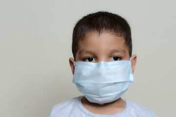 asian kid with wearing mask  due to corona virus