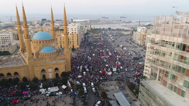 Beirut, Lebanon 2019 : day drone shot of Martyr square, during the Lebanese revolution, with thousands of protesters revolting against government failure and corruption