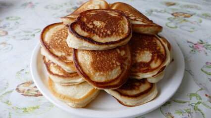 small pancakes are on a plate