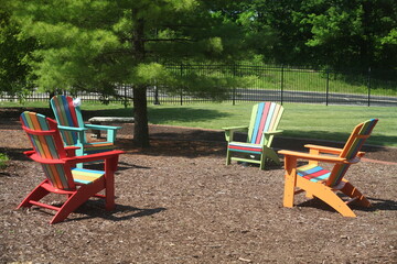 SOCIAL DISTANCING WITH COLORED LAWN CHAIRS