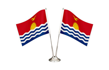 Fototapeta premium Kiribati table flag isolated on white ground. Two flag poles with flags and Kiribati flag on the table.