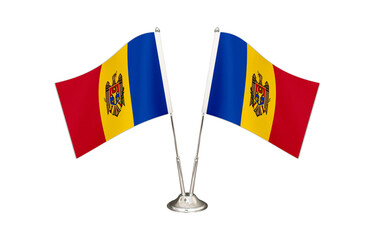 Moldova table flag isolated on white ground. Two flag poles with flags and Moldova flag on the table.