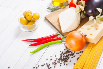 mediterranean food ingredients on white wood table