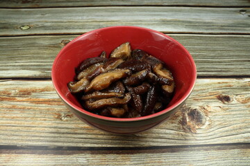 Fried cutting fresh mushroom with oil and pepper. Famous traditional ingredients in Chinese cuisine. 