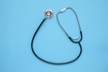 Stethoscope medical equipment on blue background healthcare concept