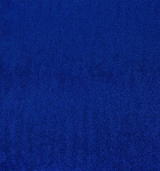Background, texture of blue sapphire with sparkles