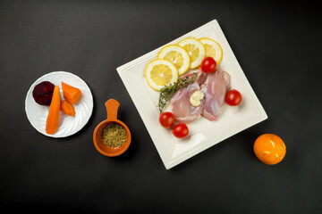 Chicken with orange and vegetables