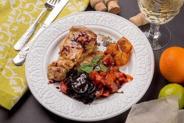 Chicken with orange and vegetables