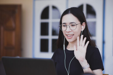 Asian women video conference by Computer notebook,New normal Video call social distancing