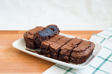 Chocolate brownie on cutting board