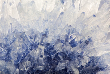 Fototapeta na wymiar light and dark blue tranparent crystals background