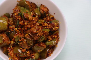 Brinjal or Egg plant dry fry, south Indian curry with roasted peanut 