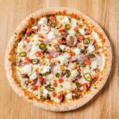 pizza on the wooden background