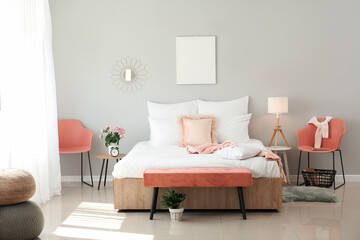 Fototapeta na wymiar Big bed and bench in interior of modern room
