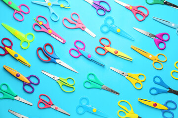 Scissors for paper on color background