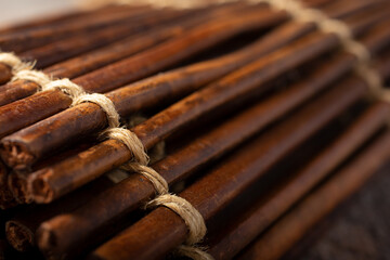 A closeup view of a foreign wicker wooden stick surface, as a background image.