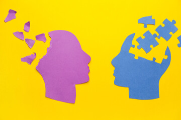 Human heads on color background. Concept of dementia