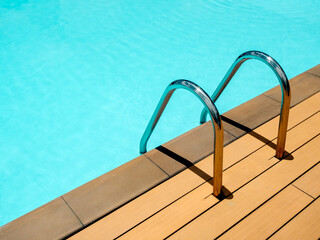 Swimming pool background with ladder minimal style. © tete_escape