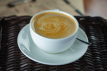 how to make latte art by barista focus in milk and coffee in vintage color