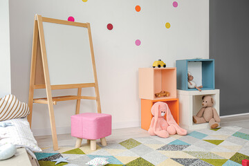 Stylish interior of modern playroom in kindergarten