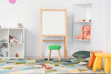 Stylish interior of modern playroom in kindergarten