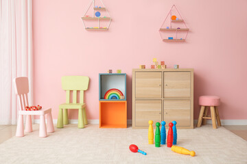 Stylish interior of modern playroom in kindergarten