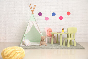 Stylish interior of modern playroom in kindergarten